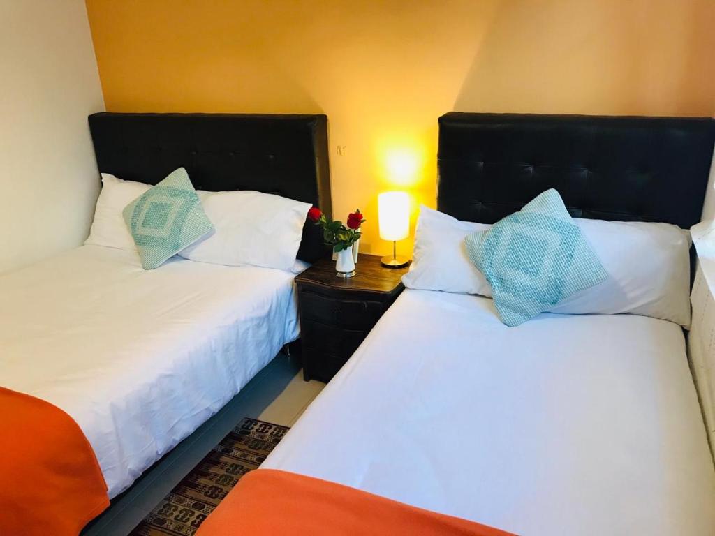 Ayenda Casa Prada - Doble (2 camas) con baño externo - 24