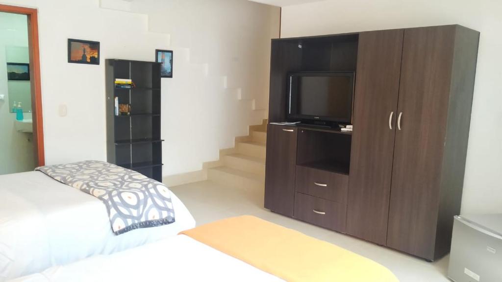 Ayenda Casa Prada - Triple con baño privado 104 - 16