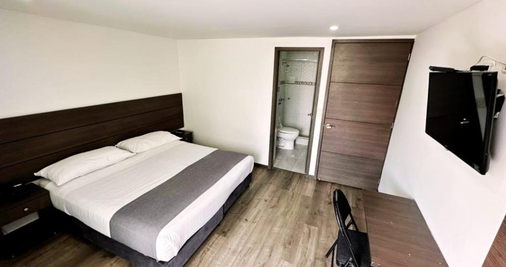 Expo Hotel Ferial - Doble: 1 King o 2 Sencillas - 0