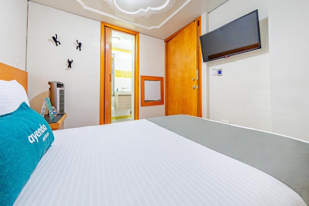 Ayenda Golden Empresarial 13